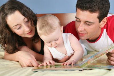 Mom and Dad Read to Baby