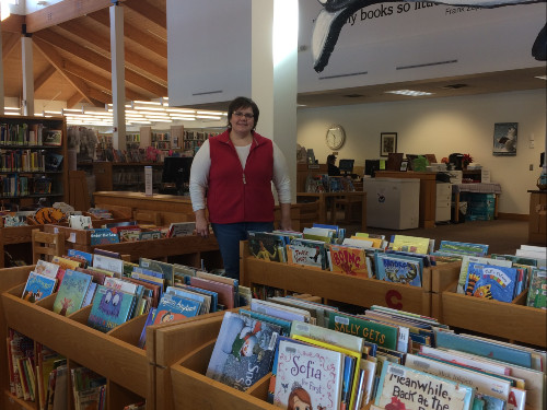 Children's Librarian Jill Deinken of Redwood Falls Public Library encourages parents to read to their children.