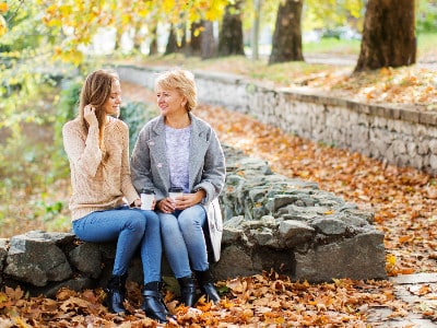 young woman talks with her confidant about emotions