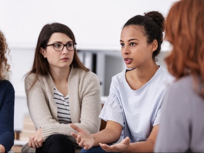 support group listens to woman support group listens to Black woman
