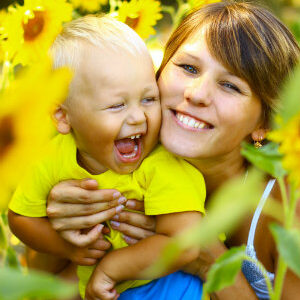 Mother and Son in Sunflowers