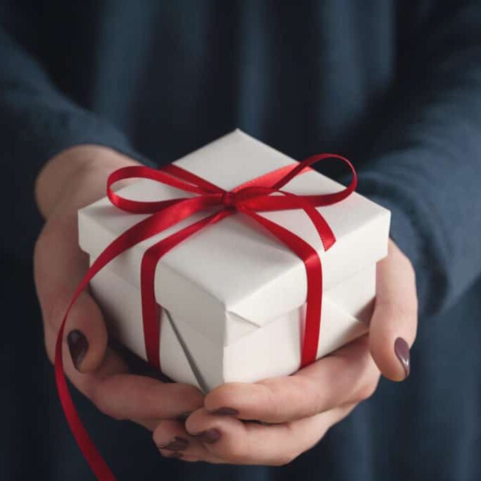 Hands Holding Gift Box