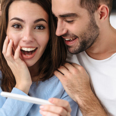 Happy Couple With Pregnancy Test