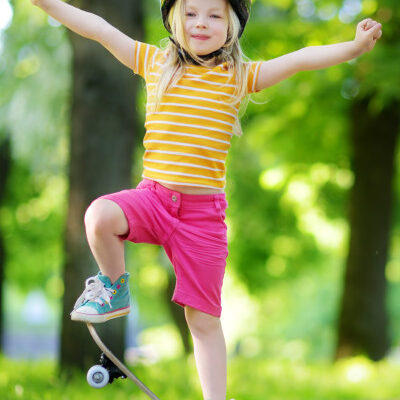 Happy Girl on Skateboard