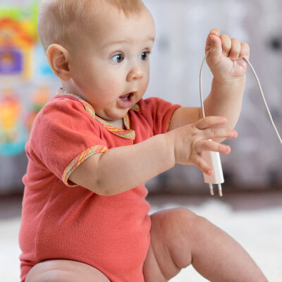 Child Playing With Phone Cord