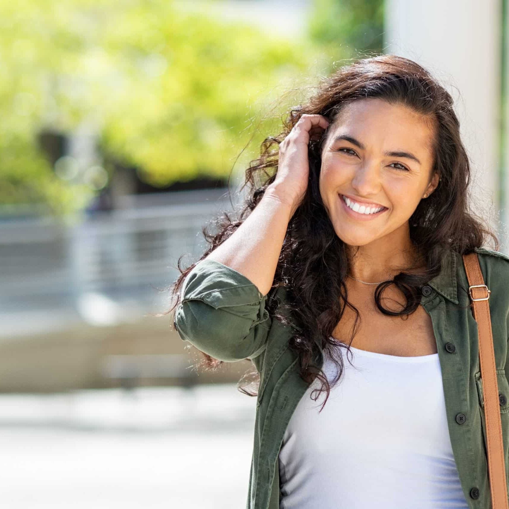 happy young woman on street